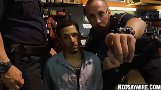 Two officers apprehend a guy then fuck him (part 1) - gay porn